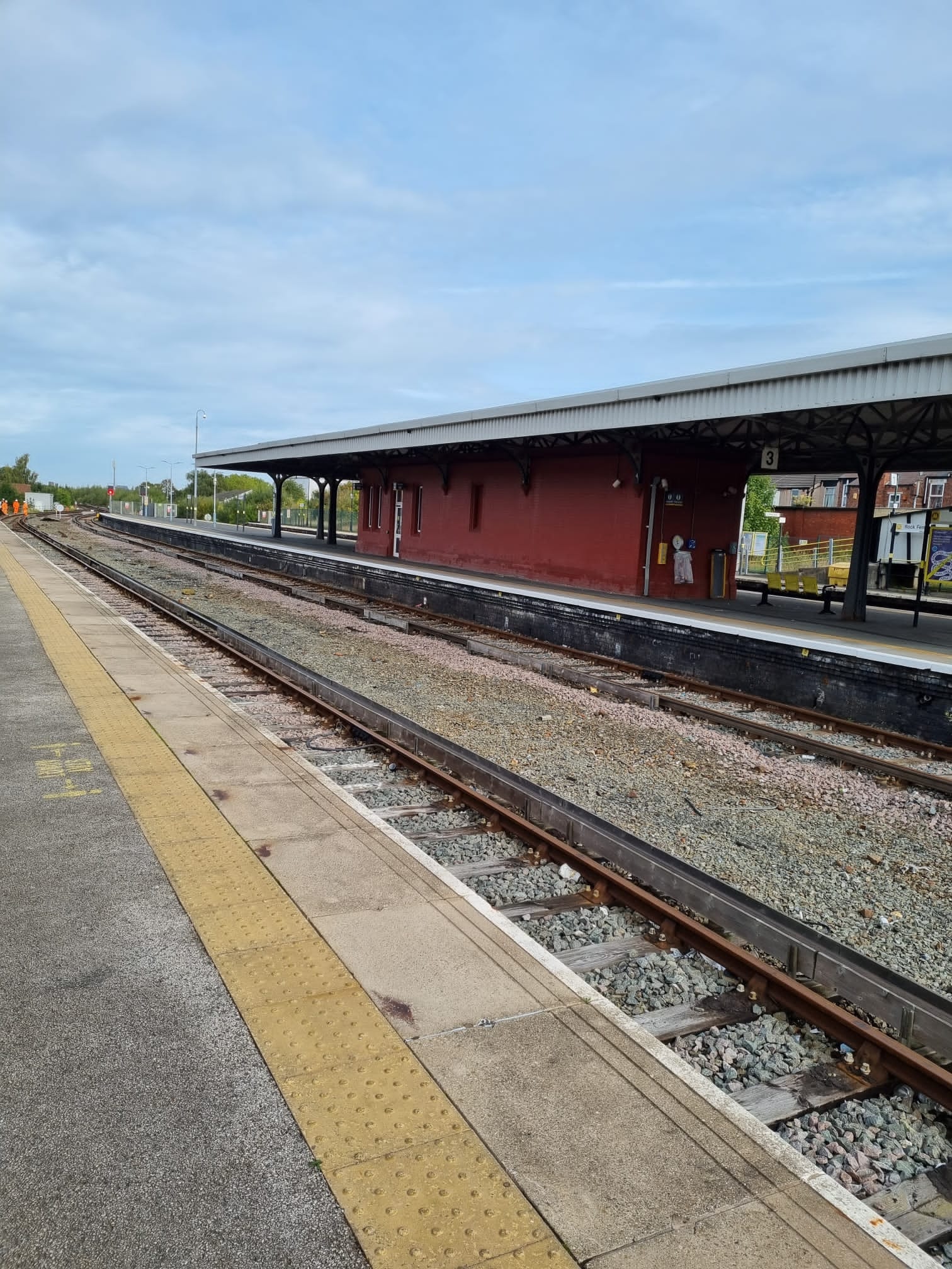 Empty train station platform daytime